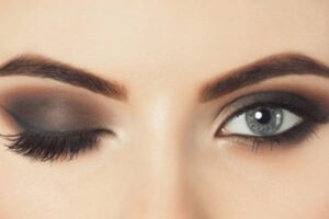 Close up of a woman's eye with a black smokey eye.